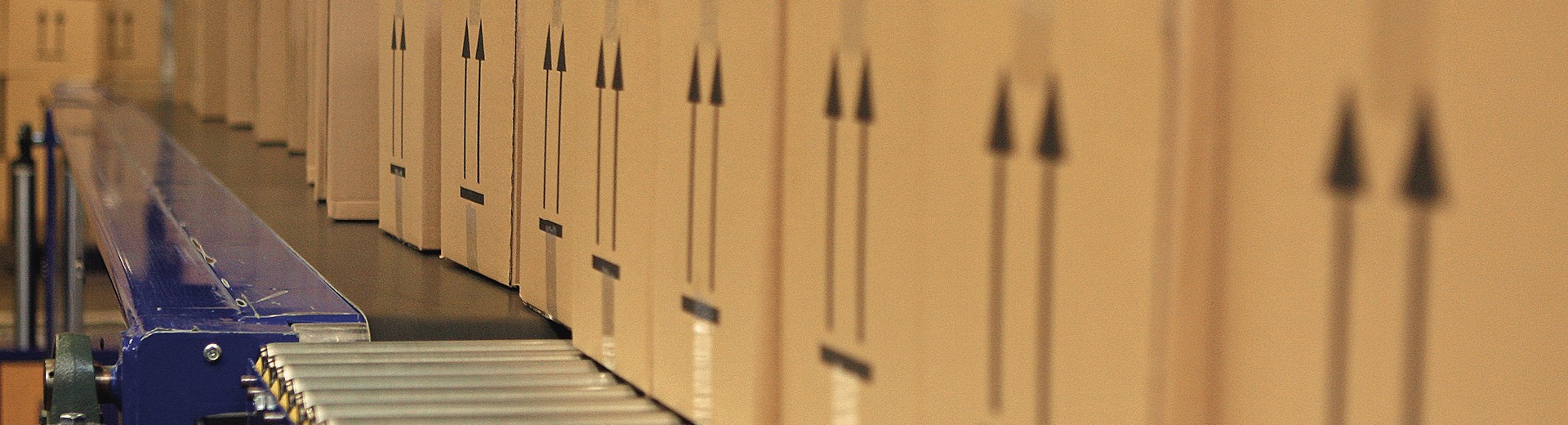 Packages neatly arranged on an automated conveyor