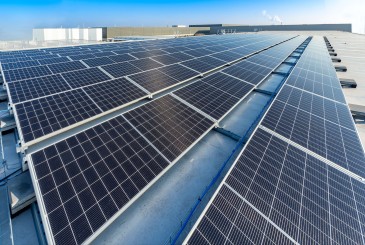 Solar panels installed on the roof of a GLS depot, generating renewable energy to reduce the company’s carbon footprint.