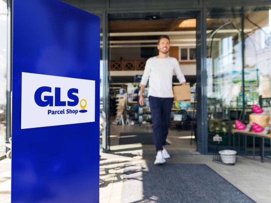 Customer leaves GLS ParcelShop with a parcel