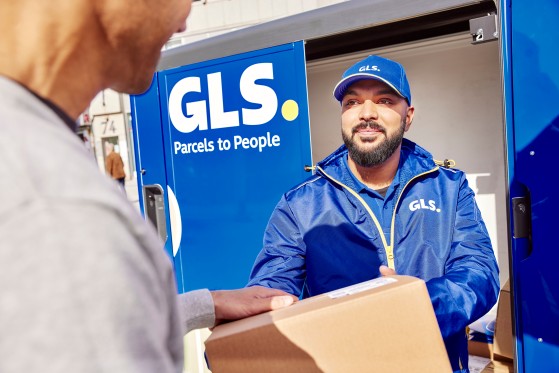 GLS courier delivers a parcel