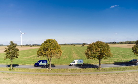 GLS vans in Dutch landscape