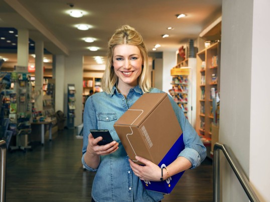 Parcel delivery by woman 